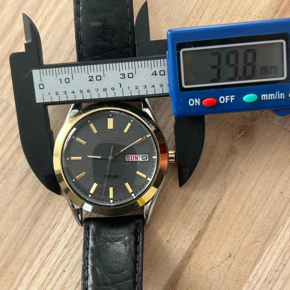 Seiko Solar Men’s Watch Two-Tone Case Dark Gray Dial Date Window Leather Strap